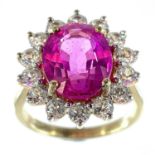 A 9ct large pink sapphire cubic zirconia set cluster ring, the Sri Lankan sapphire of 6.95ct and