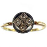 An early 20th century 18ct gold diamond set five stone target ring, the small 0.04ct diamonds in a