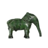 An Ottoman green glazed model of a caparisoned elephant, 19th century, possibly Canakkale, Turkey,