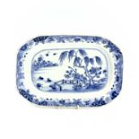 A Chinese export porcelain blue and white meat dish, 18th century, the a river scene with trees