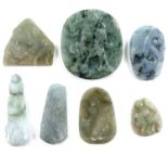 A Chinese spinach jade pendant, 5.5cm x 5cm and six other jade carvings and pendants. (7)