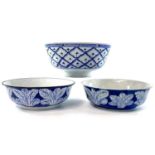 A matched pair of Chinese blue and white porcelain bowls, four character mark, decorated with pak