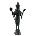 A Khmer bronze figure of Uma, height 35cm, width 17cm.