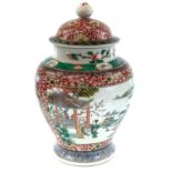 A Chinese famille verte porcelain vase and cover, 20th century, six character Kangxi mark, height