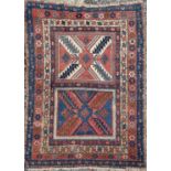 A Kazak rug, South West Caucasus, circa 1880-1900, with two large square medallions each filled with