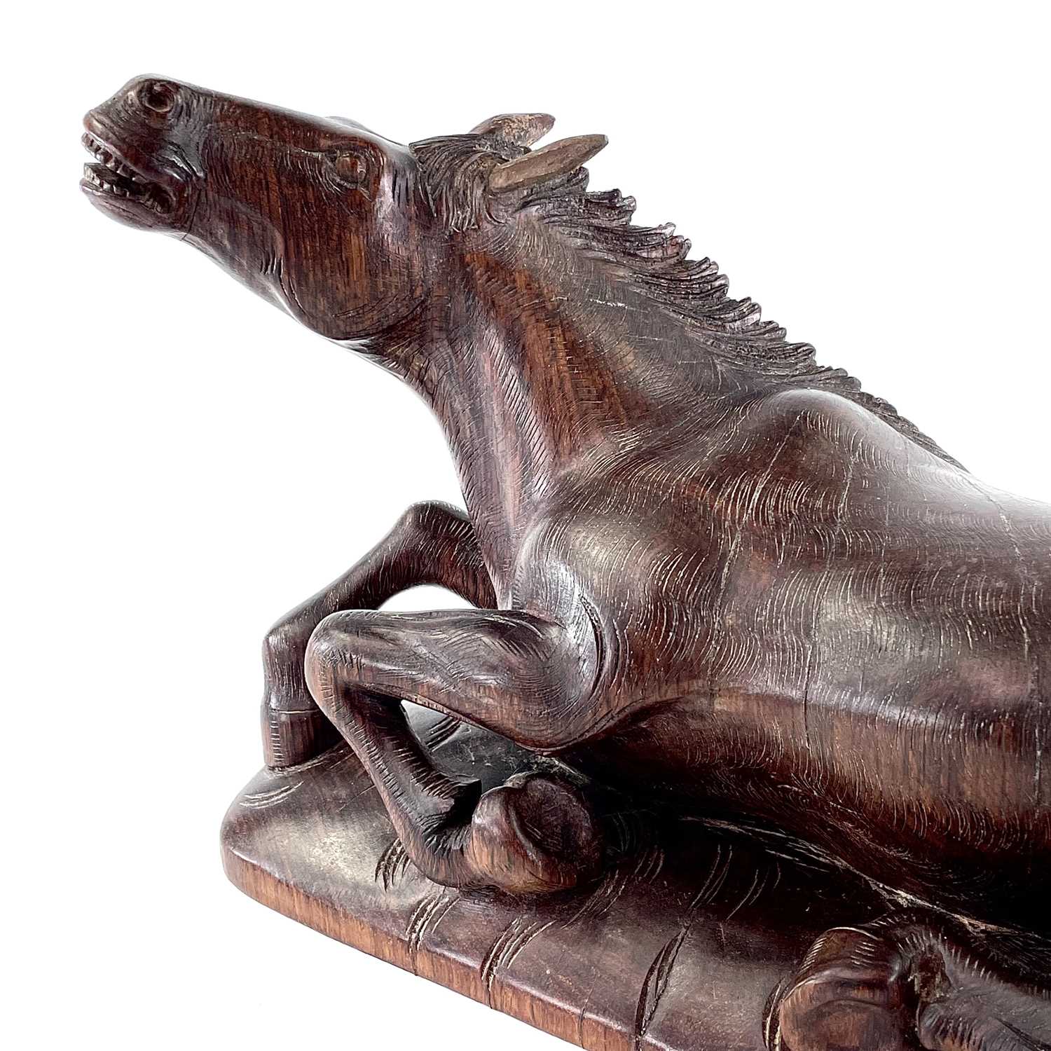 A Chinese carved wood model of a horse, 19th century, on a later base, height 20cm, width 38cm, - Image 3 of 10