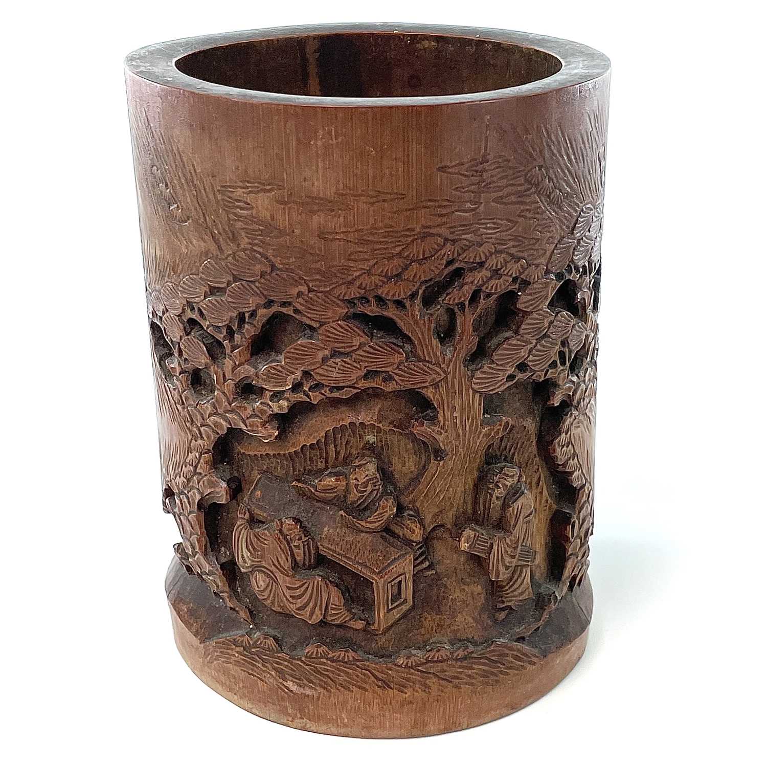 A Chinese carved bamboo brush pot, 19th century, height 17cm, diameter 12cm.