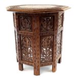 An Anglo-Indian brass inlaid octagonal occasional table, circa 1920's, with folding base, height