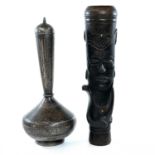 A Bidri type white metal vase, 19th century, height 12cm and an Indian pottery pipe, length 13cm. (