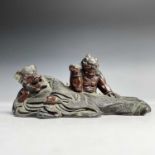A Chinese bronzed group, early 20th century, height 5cm, length 11cm, depth 5cm.Provenance: This was
