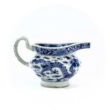 A Chinese blue and white porcelain sauce boat, 18th/19th century, decorated with dragons, height