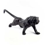 A Japanese bronze model of a tiger, Meiji Period (1868-1912), with head turned slightly to the right