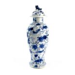 A Chinese blue and white porcelain vase and cover, late 19th century, four-character mark, decorated