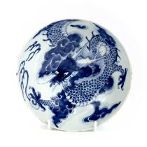 A Chinese blue and white porcelain bowl, 19th century decorated with dragons and clouds, height 7.