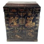 A Japanese black lacquer table cabinet, late 19th century, gilt decorated with birds, insects and