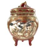 A Japanese kutani porcelain jar and cover, 19th century, signed, with three cartouches filled with