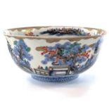 A large Chinese Imari porcelain bowl, early 19th century, the interior with a central gilt dragon