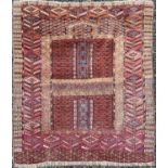 A Hatchli Turkoman rug, circa 1900, the quartered field with rows of candelabra, 143 x 125cm.glue