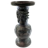 A large Japanese bronze vase, Meiji Period, signed character marks on base, decorated with a