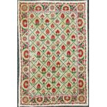 An Indian Suzani design chainstitch carpet, mid 20th century, the trellis field with rows of