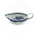 A Chinese export blue and white porcelain sauce boat, 18th century, the interior decorated with a
