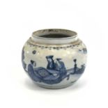 A Chinese blue and white porcelain circular pot, Kangxi Period, height 9cm, diameter 10.5cm.chip