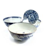 Three Chinese blue and white porcelain bowls, 18th century, height of largest 11cm, diameter 26.
