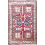 A Ziegler Chobi type rug, the red field with four large square medallions, palmettes and guls,