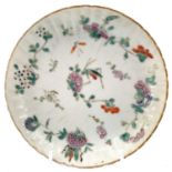 A Chinese porcelain famille rose porcelain fluted dish, 19th century, decorated with insects and