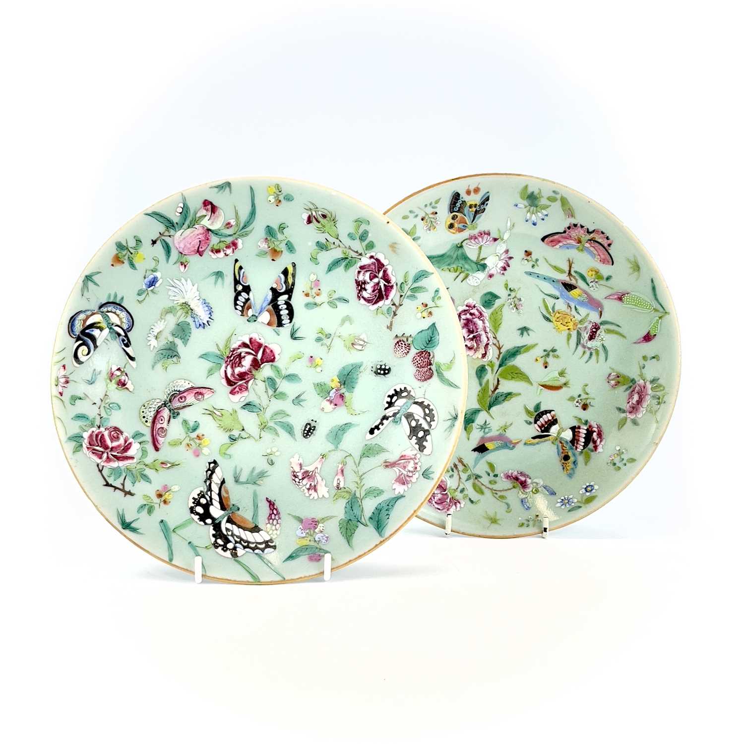 Two Chinese Canton celadon porcelain plates, 19th century, diameters 26.5cm and 25.5cm. (2)One has a