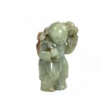 A Chinese carved jade figure of a boy, height 10cm, width 6.5cm, depth 4cm.Generally good condition.