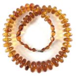 A faceted honey amber necklace, 71 grams, full length 60cm.Generally good condition. No chips or