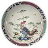 A Chinese famille verte porcelain shallow bowl, height 4.5cm, diameter 27.5cm.Numerous small chips