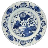 A Chinese blue and white plate, Ming Dynasty, decorated with flowers and rocks, diameter 20cm.3cm