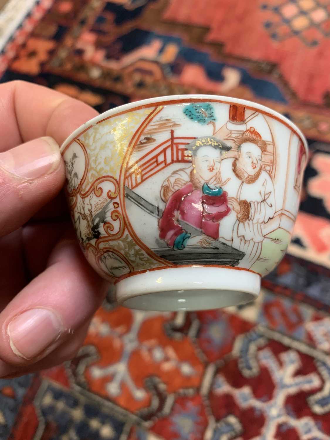 A Chinese famille rose porcelain tea bowl, 18th century, highlighted in gilt and decorated with - Image 11 of 15
