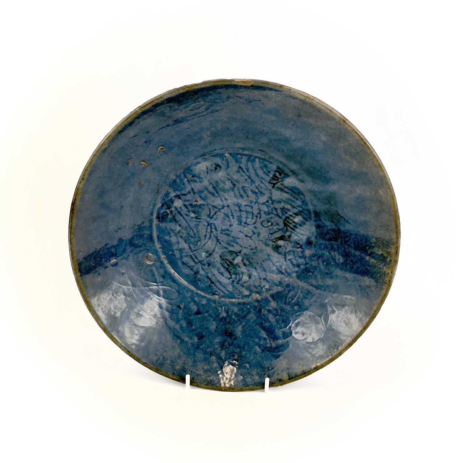 A Chinese Swatow blue glazed dish, late Ming Dynasty, 16th/early 17th century, incised with a - Image 4 of 13