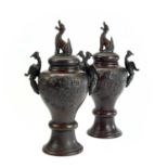 A pair of Japanese bronze vases and covers, circa 1900, height 32cm, width 17.5cm. (2)