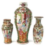 Three Chinese Canton porcelain vases, 19th century, heights 32cm, 21cm and 19.5cm. (3)The large vase