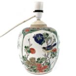 A Chinese famille verte porcelain jar, 19th century, lacking cover and coverted to a lamp, decorated
