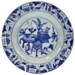 A Chinese porcelain blue and white dish, 18th century, decorated with precious objects, diameter