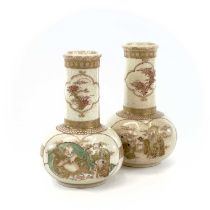 A pair of Japanese Satsuma crackle-glazed vases, 19th century, the shaped panels enclosing gilt