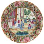 A Chinese Canton porcelain plate, 19th century, decorated with figures on a terrace, diameter 21.