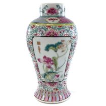 A Chinese famille rose porcelain vase, 19th century, signed, height 16cm, diameter 8cm.no