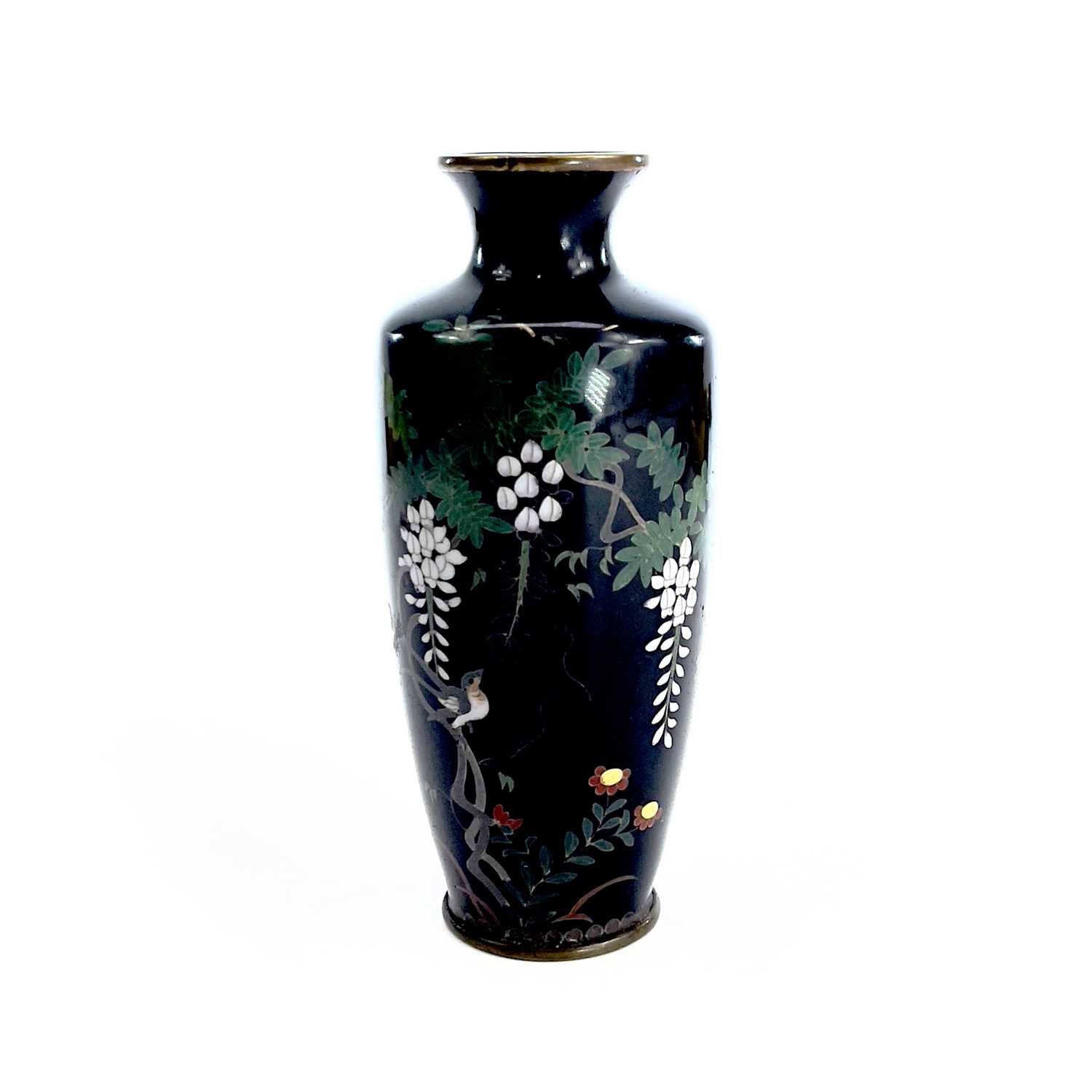 A Japanese cloisonne vase, 19th century, with a bird perched on a tree, height 12cm, width 5.5cm.