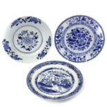 Three Chinese blue and white porcelain plates, 18th century, diameter 23cm. (3)Each with nibbles
