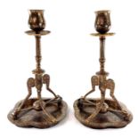A pair of Persian gold damascened metal candlesticks, early 19th century, height 25.5cm, diameter of