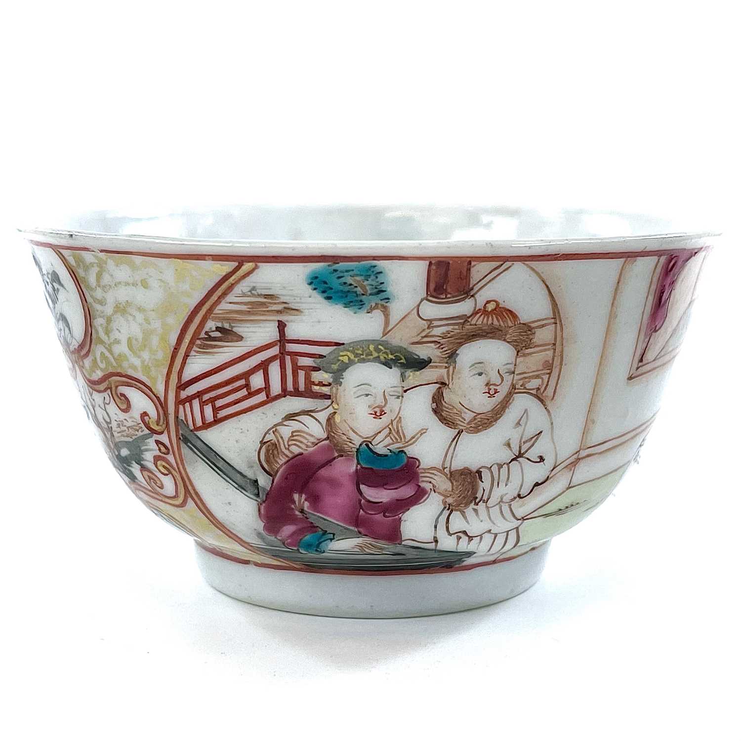 A Chinese famille rose porcelain tea bowl, 18th century, highlighted in gilt and decorated with