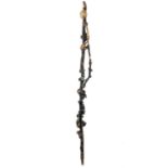 A Chinese carved rootwood walking stick, Qing Dynasty, with gilded birds and animals, surmounted