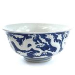 A Chinese blue and white porcelain bowl, Kangxi six character mark, with three five-clawed dragons