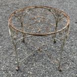 A wrought iron early 20th-century conservatory table, 76cm diameter.Lacks glass top
